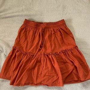 Super cute burnt orange skirt!